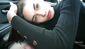 A cute babe gets a blow job in the car