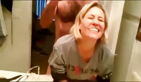 A quickie in the bathroom with a cheerful blonde