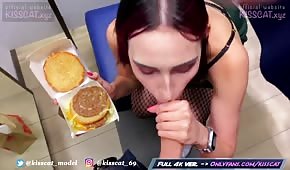 Chick is pulling a dick off a burger
