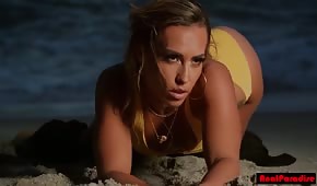 Wet chick in a yellow bikini