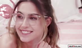 Pretty face of a horny glasses girl